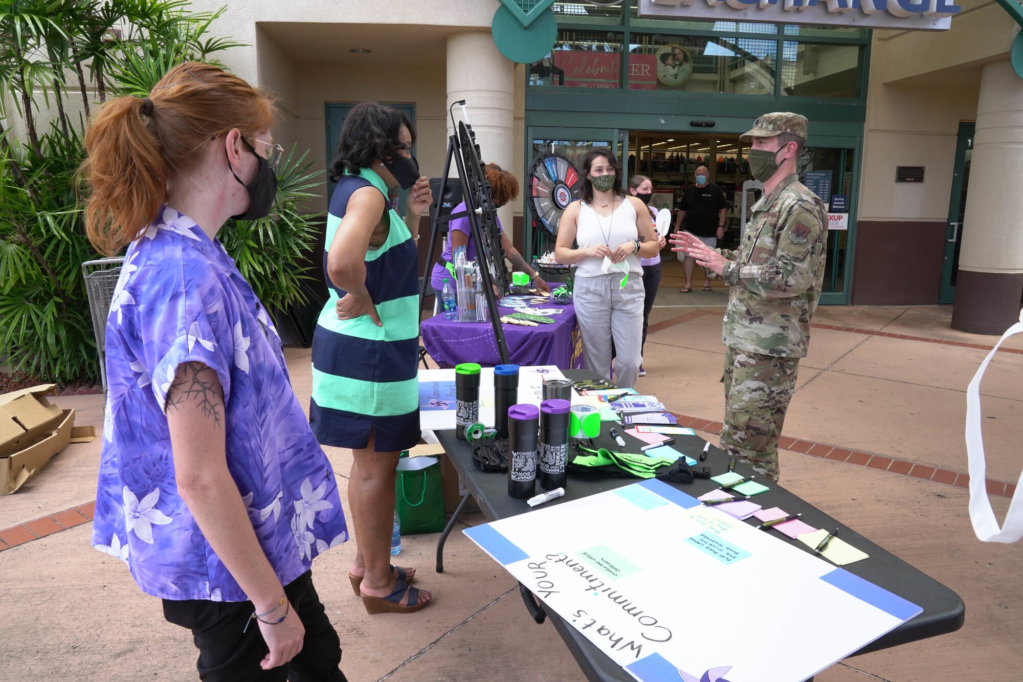 Sexual Assault Prevention and Response and Suicide Prevention facilitators host an event raising awareness about child abuse prevention to educate families at Joint Base Pearl Harbor-Hickam, Hawaii, April 23, 2021. In honor of Child Abuse Prevention Month and the Month of the Military Child, military members and their families shared and received ideas to build stronger and healthier relationships with their children. (U.S. Air Force photo by Airman 1st Class Makensie Cooper)