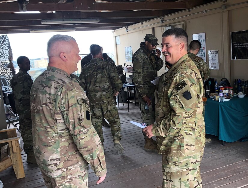 During the 28th Expeditionary Combat Aviation Brigade’s deployment to the Middle East, the sexual harassment and assault response and prevention team ran a makeshift coffee shop to provide knowledge about their program and a welcoming environment to seek help. (U.S. Army photo by Master Sgt. John Paul Karpovich)