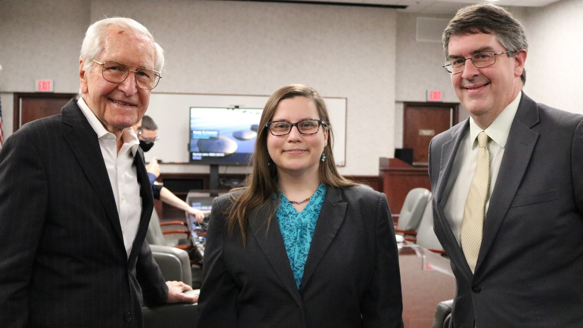 Former Air University Library Director Robert Lane (left) joined the library staff to help them celebrate the library’s 75th anniversary, April 1, 2021. Lane was director from 1974-2000. Lane is pictured with current AU Library Director Alisha Miles and AU Academic Services Director Dr. Mehmed Ali.