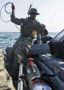 A U.S. Navy Sailor aided distressed mariners in San Diego Bay, March 26, 2021. 
	
Senior Chief Hull Maintenance Technician Mario Pais, a native of St. Petersburg, Fla., assigned to Explosive Ordnance Disposal Training and Evaluation Unit (EODTEU) 1, was with his unit at sea when he heard a distress call over the Coast Guard radio channel.

According to a San Diego Harbor Police report, Pais responded quickly to the call and took control of the scene.