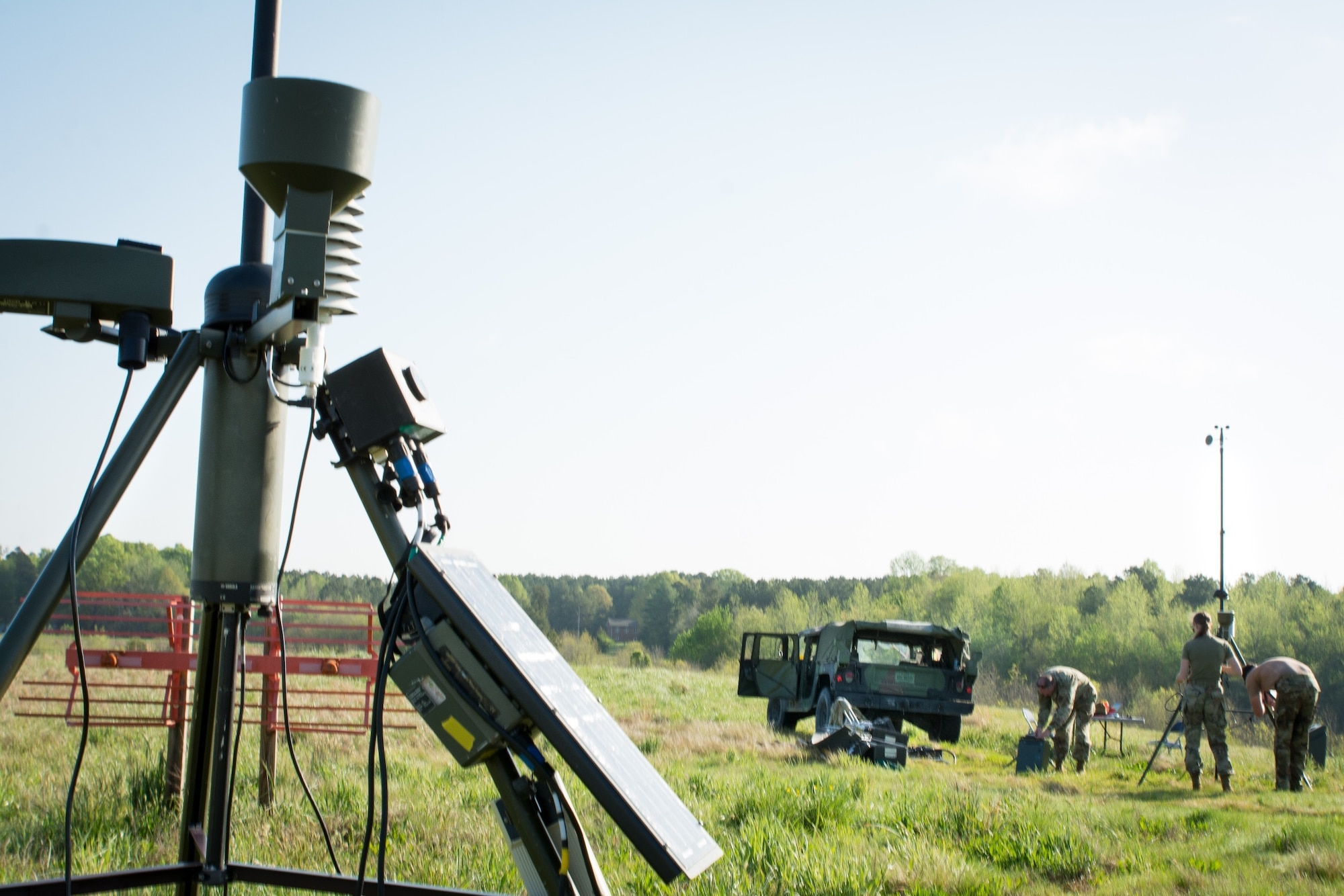 A group of Airmen assigned to the 156th Weather Flight (WF) set up a TMQ-53  portable weather station during training held at the regional training site in New London, N.C., April 11, 2021. The training the 156th WF conducts is conducted a few times a year to keep members current on their annual position qualification.