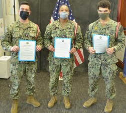GREAT LAKES, Ill. (March 8, 2021) Training Support Center Great Lakes Commanding Officer Capt. Pat Sutton advanced Navy Military Training Instructor (NMTI) Master-At-Arms 2nd Class Cedrick Hoosier, NMTI Gas Turbine System Technician Mechanical 2nd Class Rigoberto Leonvigil and NMTI Machinist’s Mate 2nd Class Capricia Portis to first class petty officers utilizing the Meritorious Advancement Program (MAP). (U.S. Navy photo by Brian Walsh/Released)