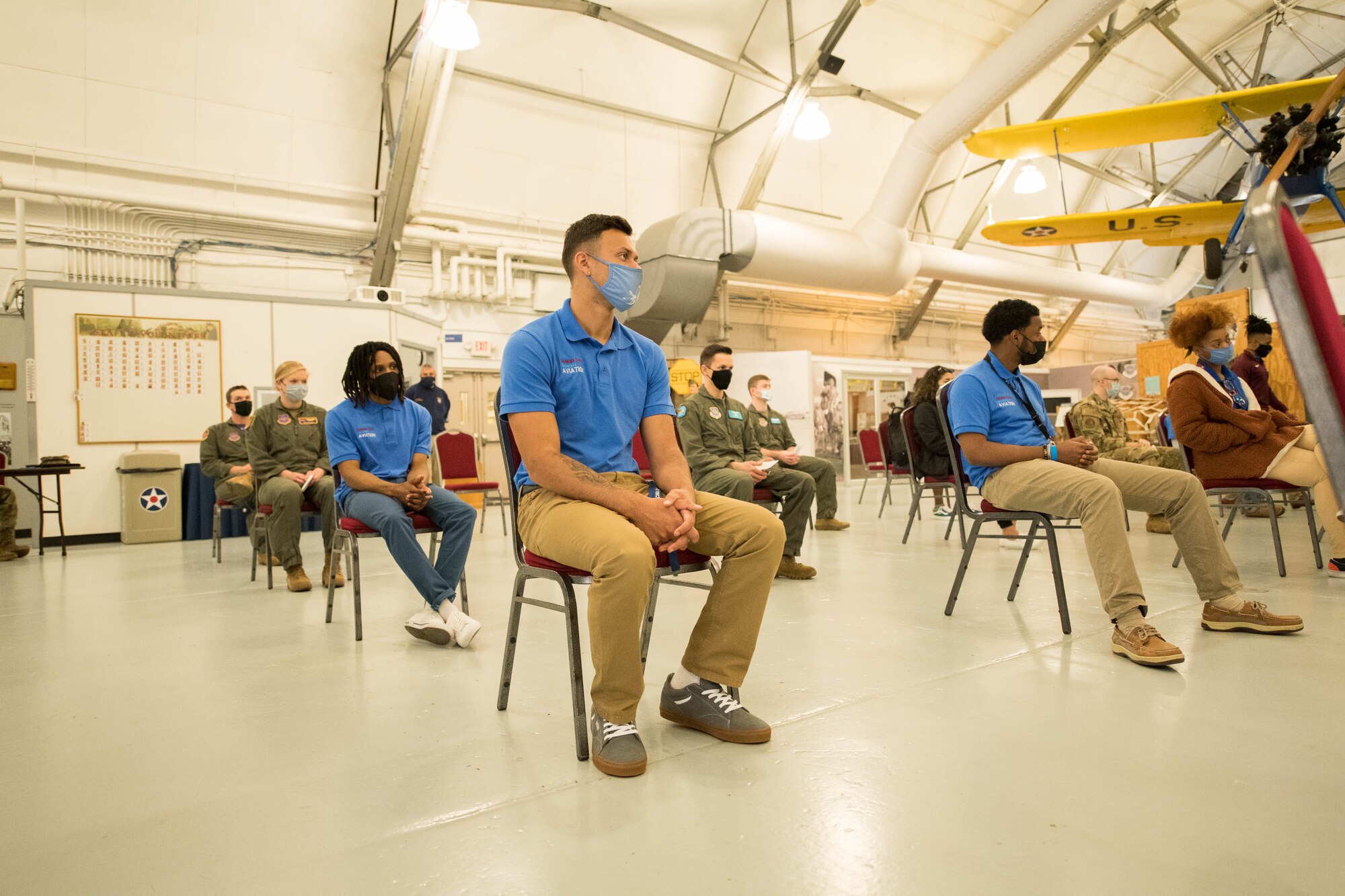 Delaware State University students and 436th Airlift Wing pilots listen to opening remarks by Col. Matthew Jones, 436th AW commander, during an aviation mentorship kickoff event at the Air Mobility Command Museum on Dover Air Force Base