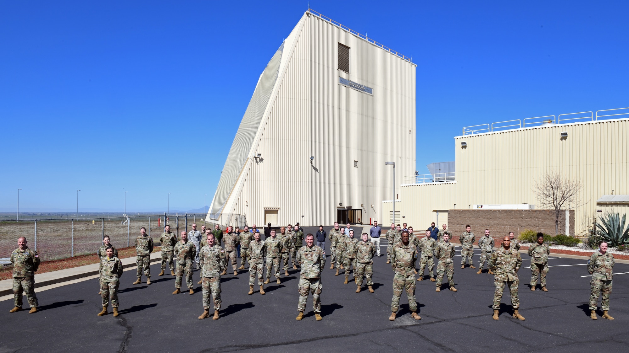 Space Delta 4 leadership stands in formation with members of the 7th Space Warning Squadron at Beale Air Force Base, Calif., March 30, 2021.