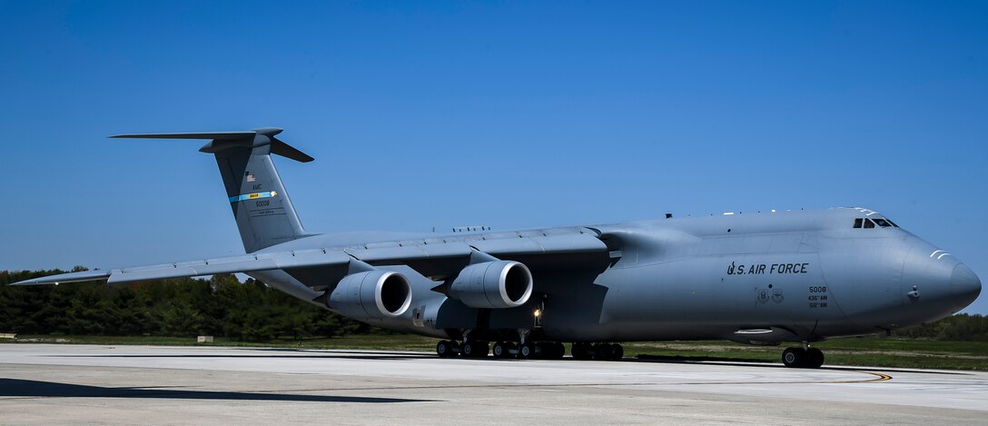 A C-5M Super Galaxy taxis down the flight line at Dover Air Force Base, Delaware, April 23, 2021. The C-5M is a strategic transport aircraft and the largest aircraft in the Air Force inventory. Its primary mission is to transport cargo and personnel for the Department of Defense. (U.S. Air Force photo by Airman 1st Class Stephani Barge)