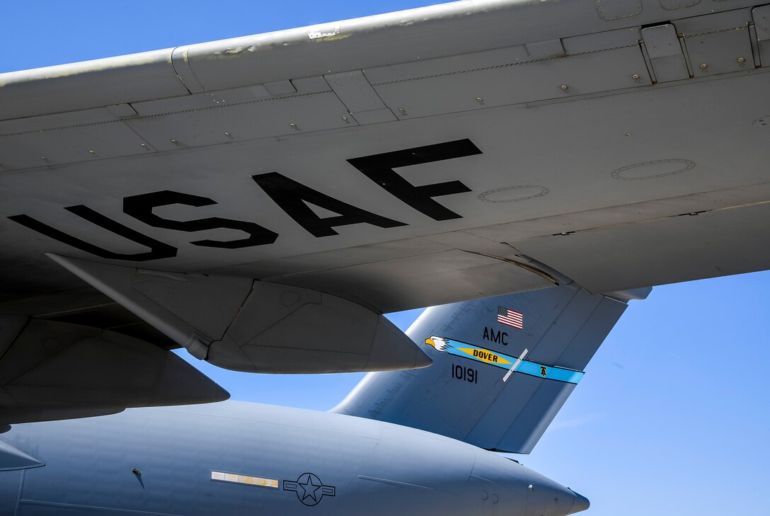 A C-17 Globemaster III sits on the flight line at Dover Air Force Base, Delaware, April 23, 2021. The C-17 can take off and land on runways as short as 3,500 feet and only 90 feet wide. Even on such narrow runways, the C-17 can turn around using a three-point star turn and its backing capability. (U.S. Air Force photo by Airman 1st Class Stephani Barge)