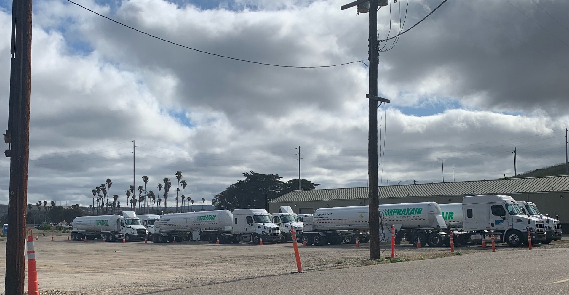 Trucks containing liquid oxygen lined up back to back