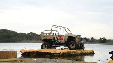 Carderock’s Asymmetric Industrial Warfare (AIW) team, led by Garry Shields, demonstrating their raft made of foam and bamboo along the Intracoastal Waterway near Camp Lejeune, N.C.