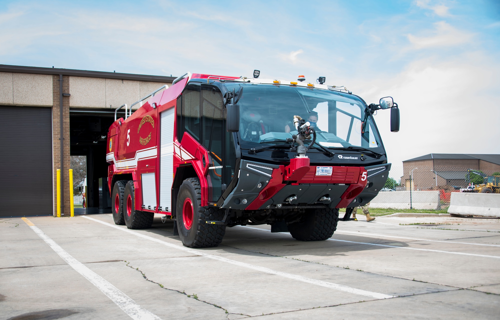 A new fire truck sits outside the base fire station, April 26, 2021, at Altus Air Force Base, Oklahoma. The new fire truck can reach speeds up to 85 miles per hour. (U.S. Air Force photo by Airman 1st Class Amanda Lovelace)