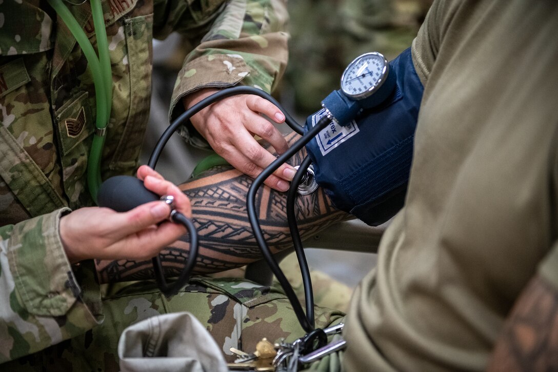 U.S. Air Force Reserve Airmen from the 932nd Airlift Wing Medical Group perform blood pressure training during a skill rodeo April 9, 2021, Scott Air Force Base, Illinois.  Each unit training assembly medical technicians are given the opportunity to practice their life saving skills and build teamwork learning from one another. (U.S. Air Force photo by Christopher Parr)
