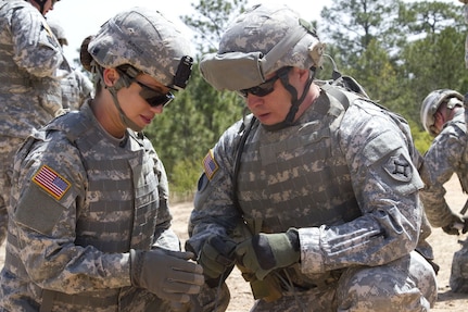 Vermont became the first state to allow women into all combat arms units April 28, 2021, following authorization issued by the National Guard Bureau. Pictured, Spc. Maryi Burnside (left) and Sgt. Vic Harper, both assigned to the Florida National Guard's 779th Engineer Battalion, prepare a piece of detonation cord that will be attached to a block of composition C4 at McCrady Training Center April 10, 2016. (U.S. Army photo)