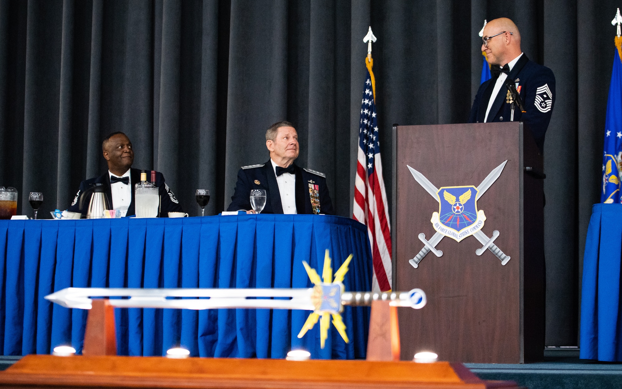 Retired Gen. Robin Rand, former Air Force Global Strike Command commander, is honored at an Order of the Sword ceremony at Barksdale Air Force Base, Louisiana, April 23, 2021. The Order of the Sword is a rare honor bestowed on a senior officer or civilian by the noncommissioned officers of a command to recognize individuals who have made significant contributions to the enlisted corps. (U.S. Air Force photo by Airman 1st Class Jacob B. Wrightsman)