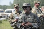 U.S. Army Spc. Gloria Kamencik, a scout with Alpha Troop, 1st Squadron, 172nd Calvary Regiment, 86th Infantry Brigade Combat Team (Mountain), Vermont National Guard, speaks to Vermont State representatives at Fort Drum, N.Y., June 15, 2017. The representatives had an opportunity to speak with and visit multiple Soldiers during their summer annual training. (U.S. Air National Guard photo by Tech. Sgt. Sarah Mattison)