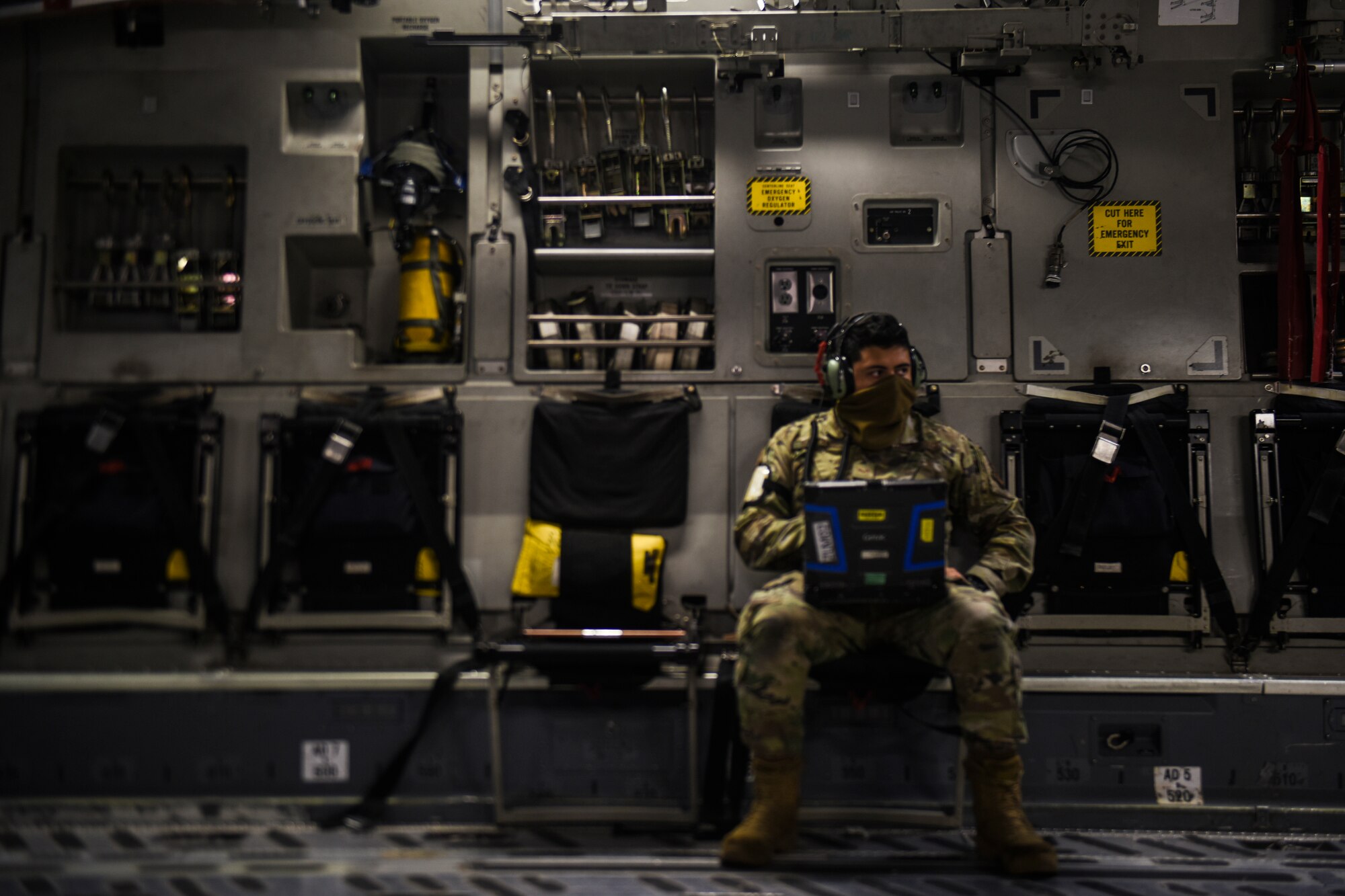 U.S. Air Force Senior Airman Eduardo Sanchez, 62nd Aircraft Maintenance Squadron crew chief, reviews his C-17 Globemaster III maintenance checklist as part of Exercise Rainier War at Joint Base Lewis-McChord, Washington, April 26, 2021. Rainier War tests the 62nd Airlift Wing's capability to plan, generate and execute a deployment tasking, sustain contingency operations, demonstrate full spectrum readiness while executing agile combat employment in a contested, degraded and operationally limited environment. (U.S. Air Force photo by Master Sgt. Julius Delos Reyes)