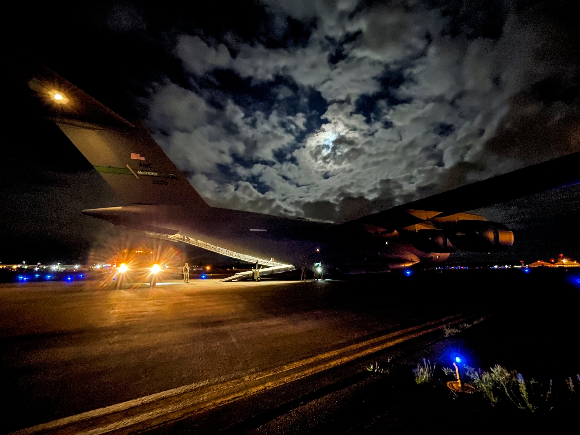U.S. Air Force Airmen with the 62nd Airlift Wing and 627th Logistics Readiness Squadron perform a wet-wing defuel procedure on a C-17 Globemaster III as part of Exercise Rainier War at Joint Base Lewis-McChord, Washington, April 27, 2021. Rainier War tests the 62nd Airlift Wing's capability to plan, generate and execute a deployment tasking, sustain contingency operations, demonstrate full spectrum readiness while executing agile combat employment in a contested, degraded and operationally limited environment. (U.S. Air Force photo by Master Sgt. Julius Delos Reyes)