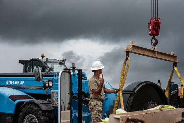 Two Barrier Arresting Kits sit on a trailer on the flight line at Andersen Air Force Base, Guam, April 26, 2021.