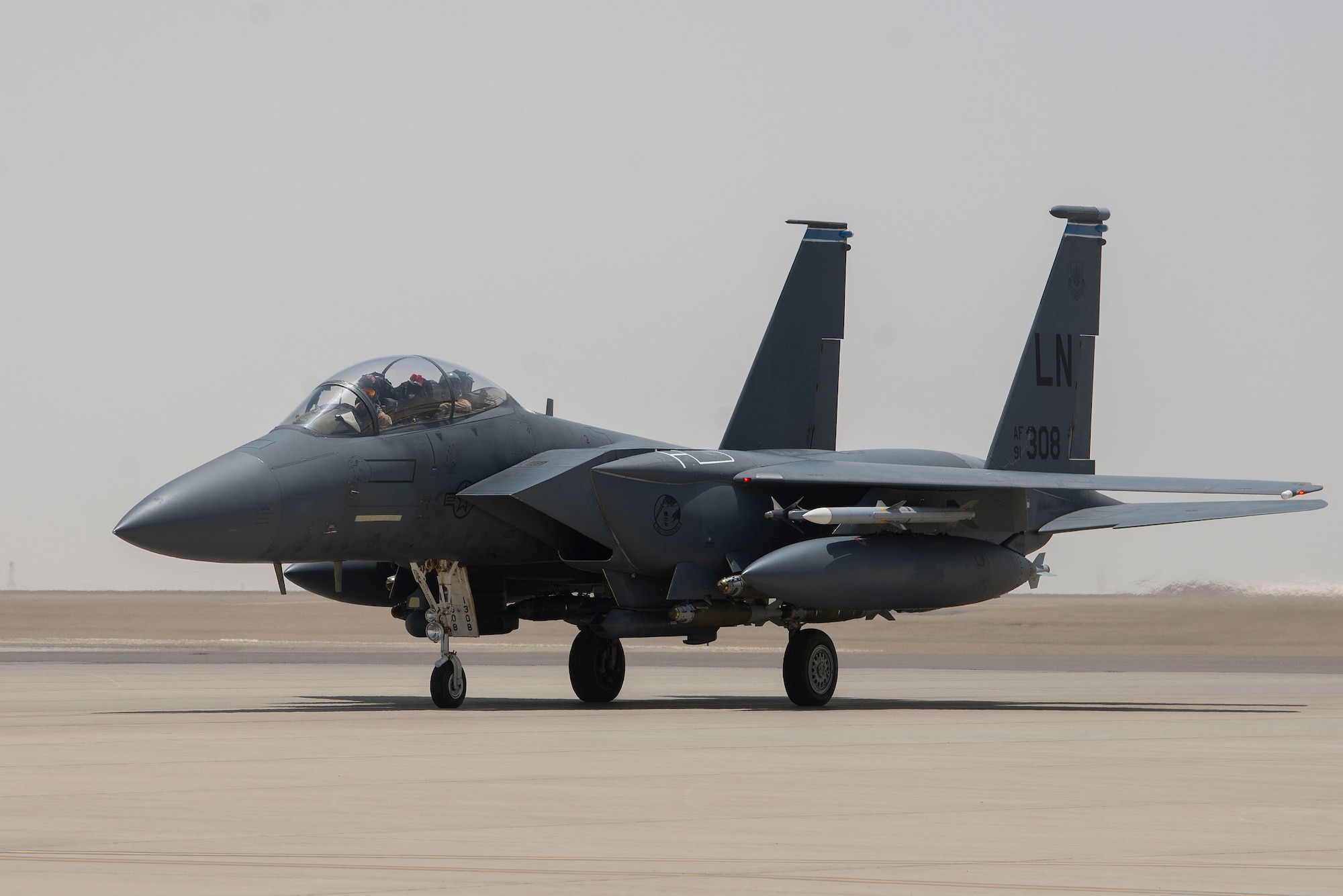 An F-15E Strike Eagle piloted by a member of the 494th Expeditionary Fighter Squadron (EFS) taxis on the flightline after landing at Al Dhafra Air Base, United Arab Emirates, April 25, 2021.