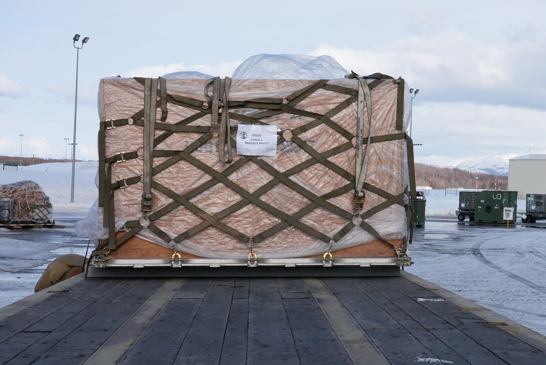 An URSUS-developed pallet processes in the cargo deployment function at the Joint Mobility Complex during Polar Force 21-5 at Joint Base Elmendorf-Richardson, Alaska, March 30, 2021. Polar Force is a training exercise designed to test JBER’s mission readiness and hone Airmen’s skills and techniques in a simulated expeditionary environment. URSUS is a responsive web application that will speed up the deployment process. The exercise allowed URSUS to be tested in a real-world environment and receive instant feedback from Airmen.