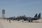 Six F-15E Strike Eagles assigned to the 494th Expeditionary Fighter Squadron (EFS) line up on the flightline at Al Dhafra Air Base, United Arab Emirates, April 25, 2021.