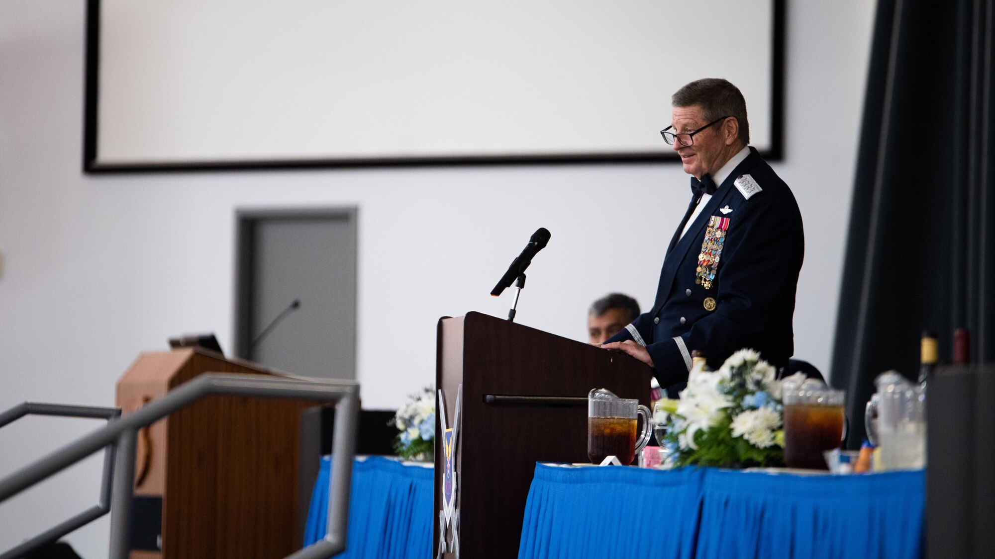 Retired Gen. Robin Rand, former Air Force Global Strike Command commander, makes remarks after being honored at an Order of the Sword ceremony at Barksdale Air Force Base, Louisiana, April 23, 2021. The Order of the Sword is a rare honor bestowed on a senior officer or civilian by the noncommissioned officers of a command to recognize individuals who have made significant contributions to the enlisted corps. (U.S. Air Force photo by Airman 1st Class Jacob B. Wrightsman)