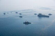 210421-A-BD272-0359 ARABIAN GULF (April 21, 2021) - A multinational group of mine countermeasure ships from the French Marine Nationale, UK Royal Navy and U.S. Navy operate in formation during exercise Artemis Trident 21 in the Arabian Gulf, April 21. Artemis Trident 21 is a multilateral mine countermeasures exercise between the UK, Australia, France and U.S., designed to enhance mutual interoperability and capabilities in mine hunting and clearance, maritime security and dive operations, allowing participating naval forces to effectively develop the necessary skills to address threats to regional security, freedom of navigation and the free flow of commerce. (U.S. Army photo by Spc. Theoren Neal)
