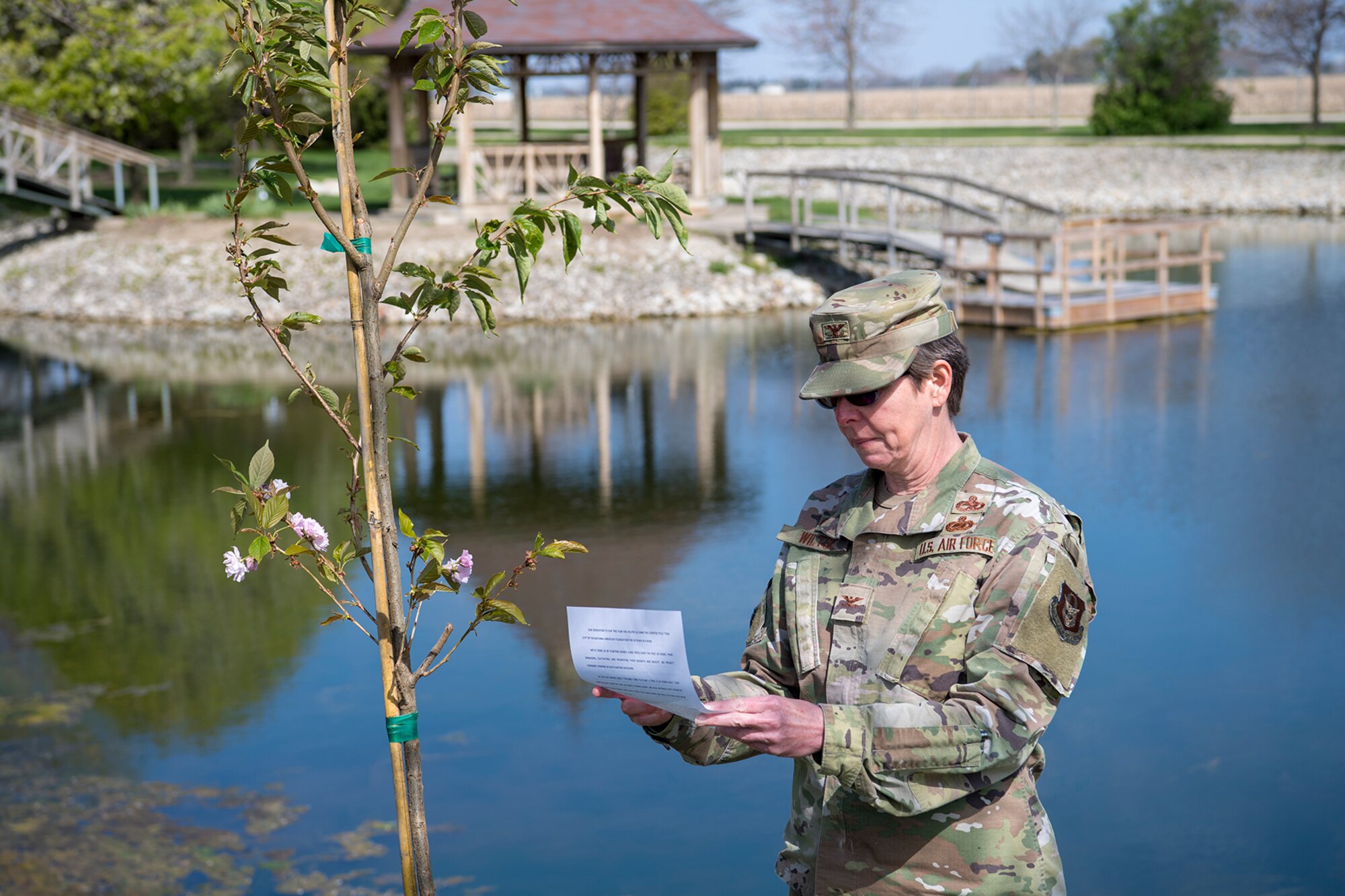 Col. Gretchen Wiltse, 434th Mission Support Group commander, speaks during a tree planting ceremony held here April 23, 2021. Grissom planted a cherry tree to celebrate Arbor Day. (U.S. Air Force photo/Douglas Hays)