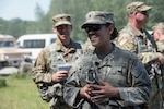 U.S. Army Spc. Gloria Kamencik, a scout with Alpha Troop, 1st Squadron, 172nd Cavalry Regiment, 86th Infantry Brigade Combat Team (Mountain), Vermont National Guard, speaks to Vermont state representatives at Fort Drum, N.Y., June 15, 2017.