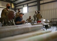 Joint Task Force Civil Support Geographic Information Systems Analyst Chris Fox gives 4th Combat Aviation Brigade personnel in-depth training on Joint All-Domain Command and Control (JADC2) used for distributed operations during exercise Guardian Response 21 (GR 21) at Himsel Army Airfield on Camp Atterbury, Indiana, April 27, 2021.