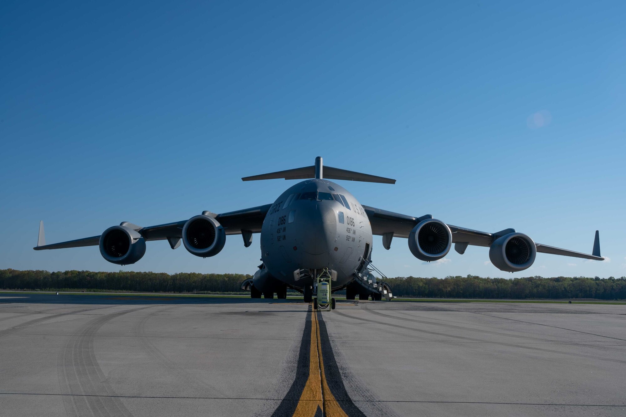 A C-17 Globemaster III is prepared for a local training flight at Dover Air Force Base, Delaware, April 22, 2021. The 3rd Airlift Squadron operates the C-17 to provide global reach with unique, outsized and oversized airlift capability. (U.S. Air Force photo by Airman 1st Class Faith Schaefer)