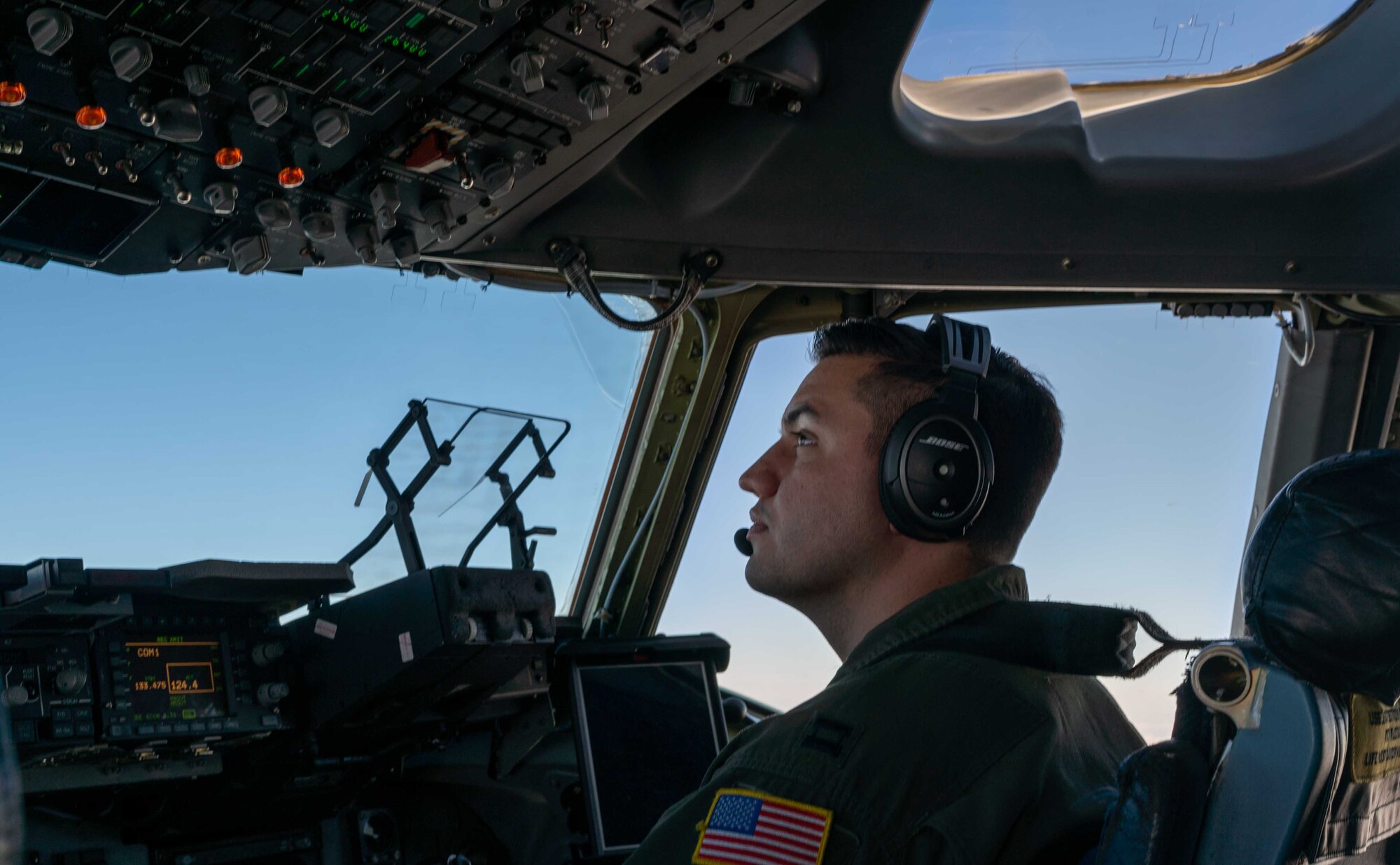 Capt. Stephen Tice, 3rd Airlift Squadron pilot, flies a C-17 Globemaster III during a local training flight over Ohio, April 22, 2021. The 3rd AS trains to support global engagement through direct delivery of critical theater assets and to ensure combat readiness of Air Mobility Command C-17 aircrews. (U.S. Air Force photo by Airman 1st Class Faith Schaefer)