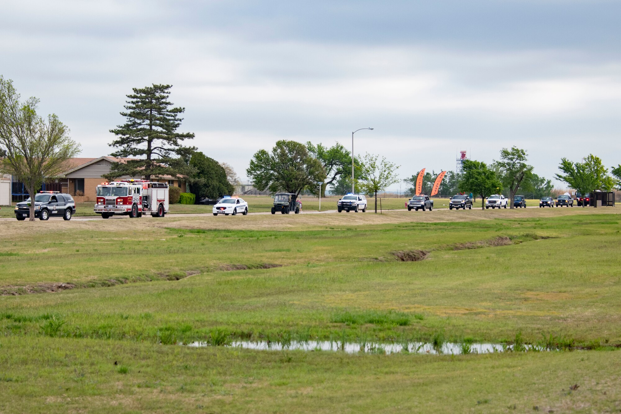 Cars line up for a parade