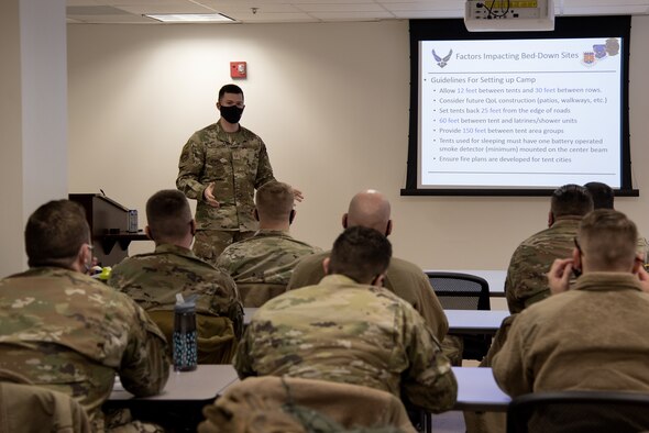 Airmen receive a briefing