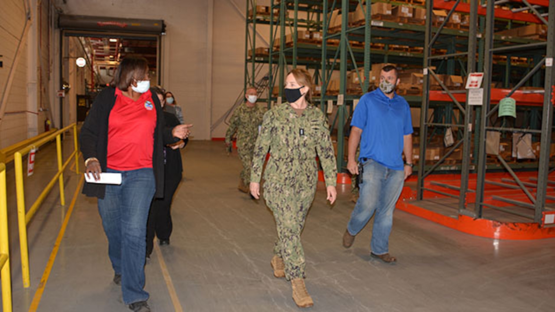 Acting area manager shows admiral disposition services warehouse operations.