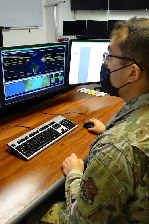 Photo of airman training at a computer