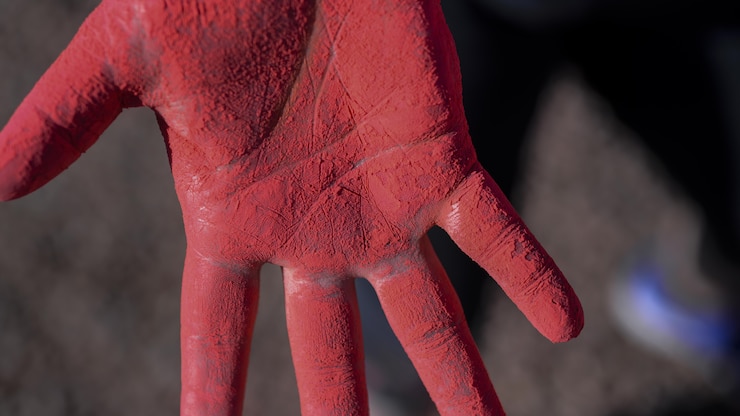 hand with red chalk
