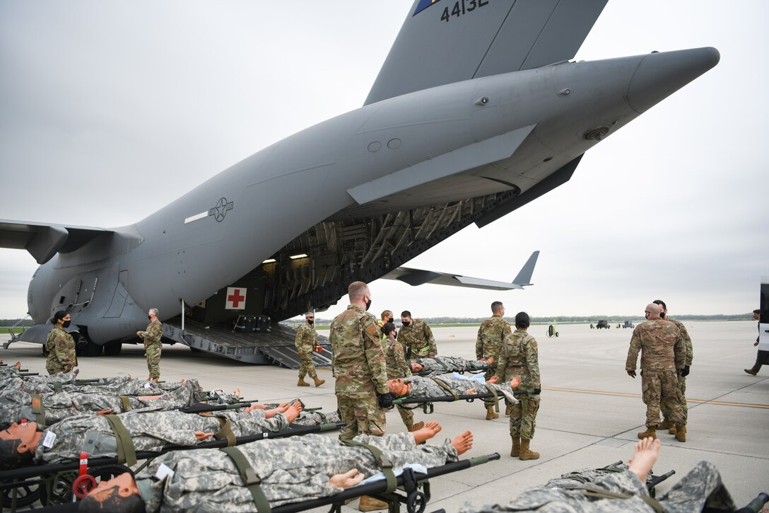 Medical personnel from Wright-Patterson Air Force Base, Ohio transport “patients” during the annual Exercise Ultimate Caduceus April 28, 2021.