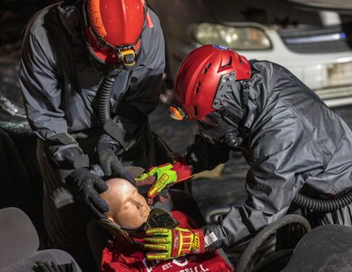 Search and rescue Soldiers of the California National Guard, 216th Engineer Movement Augmentation Company, Pomona, California, place a neck brace on a mock casualty during vehicle extraction training at Muscatatuck Urban Training Center April 24-25, 2021. The training was part of Guardian Response 2021, a multicomponent Homeland Emergency Response Exercise run by the Army Reserve’s 78th Training Division.