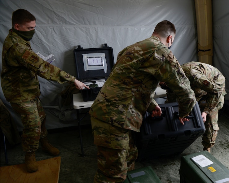 Airmen set up a mobile command post