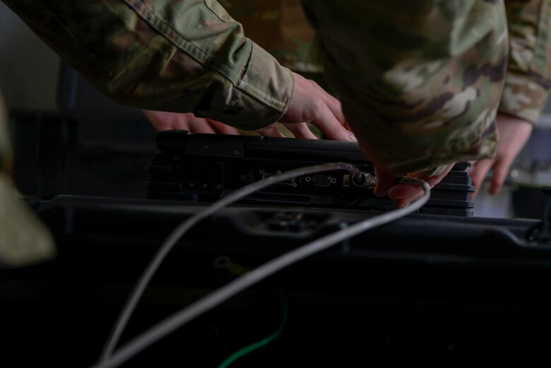 Airmen set up a mobile command post