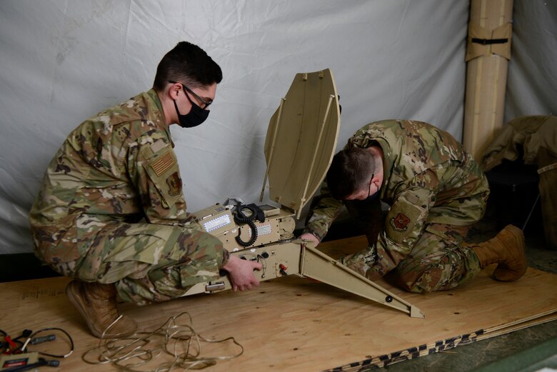Airmen set up a mobile command post