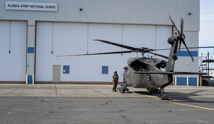 A hoist-capable UH-60 Black Hawk helicopter and aircrew from the 1st Battalion, 207th Aviation Regiment, Alaska Army National Guard, arrives in Bethel, Alaska, April 27, 2021, as part of the State of Alaska’s effort to prepare for disaster response in the Yukon-Kuskokwim region during the spring flood season. While stationed in Bethel, the crew will continue to train on their federal mission and remain ready to respond to any requests for support from civil authorities through the State Emergency Operations Center.