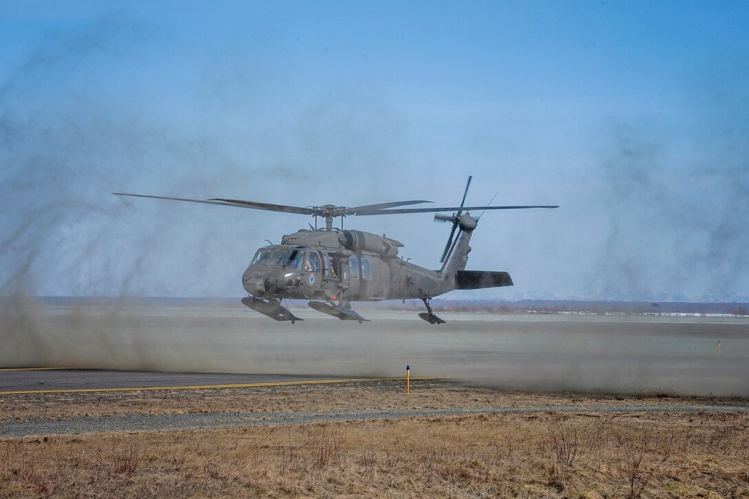 A hoist-capable UH-60 Black Hawk helicopter and aircrew from the 1st Battalion, 207th Aviation Regiment, Alaska Army National Guard, arrives in Bethel, Alaska, April 27, 2021, as part of the State of Alaska’s effort to prepare for disaster response in the Yukon-Kuskokwim region during the spring flood season. While stationed in Bethel, the crew will continue to train on their federal mission and remain ready to respond to any requests for support from civil authorities through the State Emergency Operations Center.