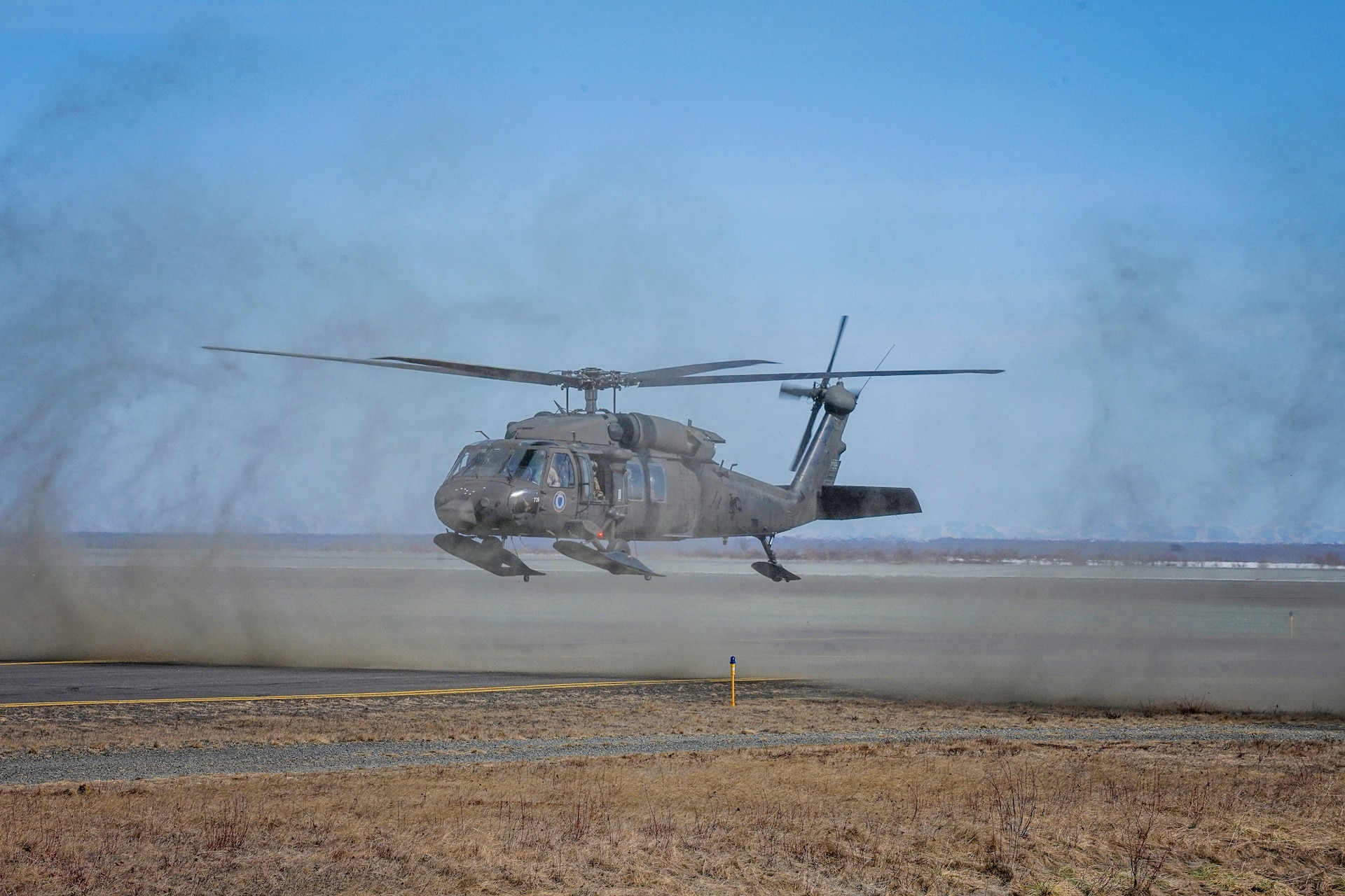 A hoist-capable UH-60 Black Hawk helicopter and aircrew from the 1st Battalion, 207th Aviation Regiment, Alaska Army National Guard, arrives in Bethel, Alaska, April 27, 2021, as part of the State of Alaska’s effort to prepare for disaster response in the Yukon-Kuskokwim region during the spring flood season. While stationed in Bethel, the crew will continue to train on their federal mission and remain ready to respond to any requests for support from civil authorities through the State Emergency Operations Center.