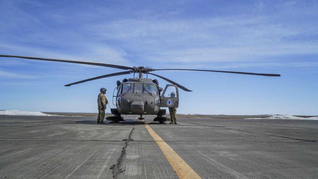 A hoist-capable UH-60 Black Hawk helicopter and aircrew from the 1st Battalion, 207th Aviation Regiment, Alaska Army National Guard, arrives in Bethel, Alaska, April 27, 2021, as part of the State of Alaska’s effort to prepare for disaster response in the Yukon-Kuskokwim region during the spring flood season. While stationed in Bethel, the crew will continue to train on their federal mission and remain ready to respond to any requests for support from civil authorities through the State Emergency Operations Center.