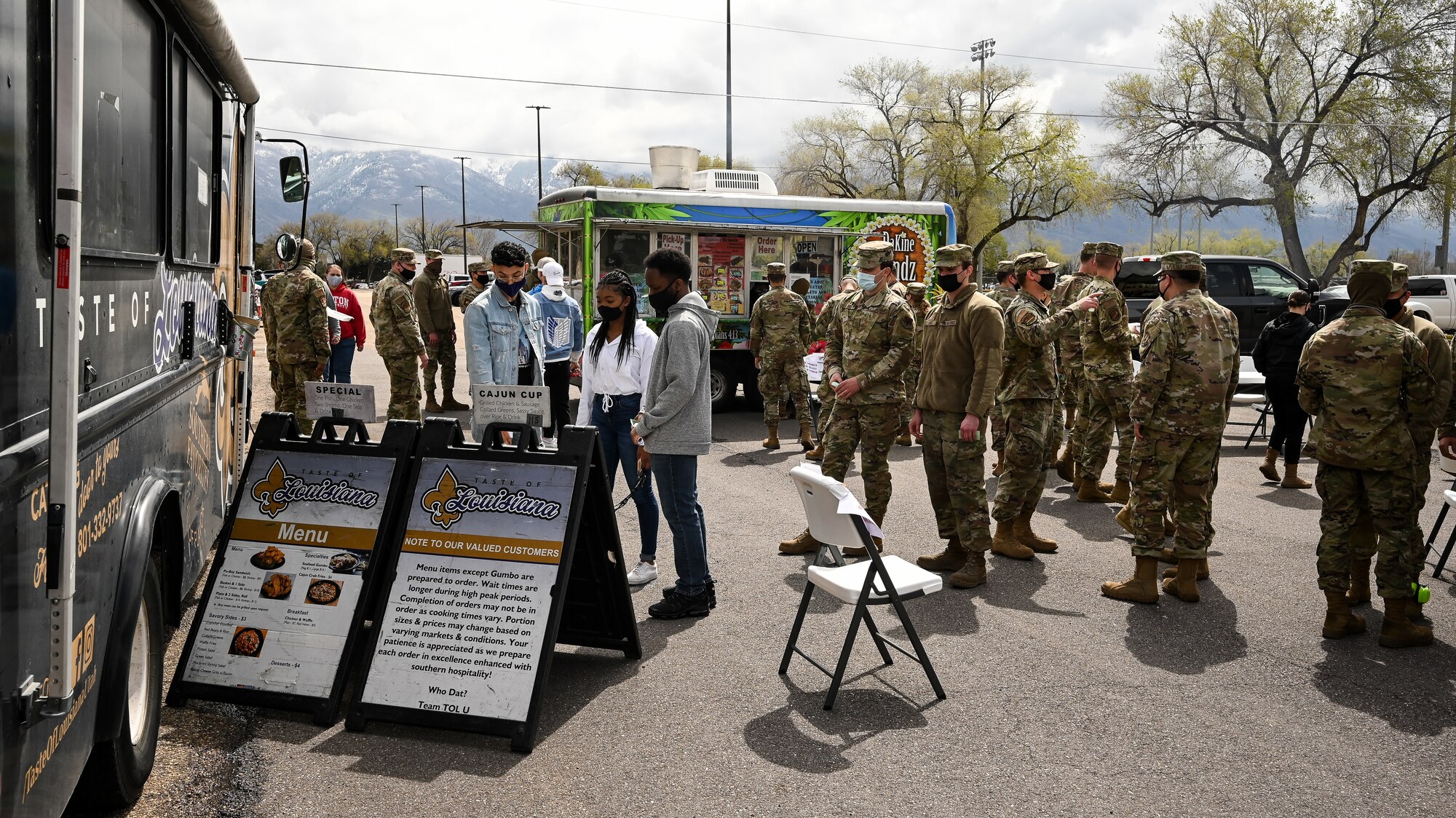 Airmen line up and order food.