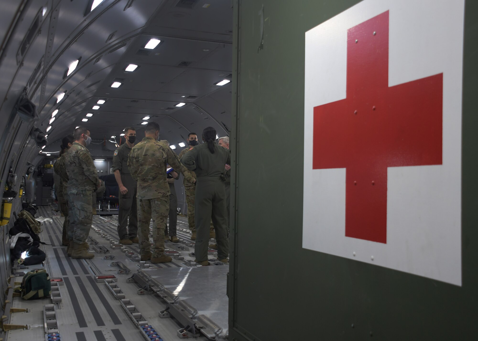 Aeromedical evacuation Airmen from across the Air Force Reserve tour the new KC-46A Pegasus tanker aircraft at Dobbins Air Reserve Base, Ga, on April 22, 2021. The aircraft, from the 916th Air Refueling Wing, was flown by the 77th Air Refueling Squadron. (U.S. Air Force photo by Tech. Sgt. Miles Wilson)