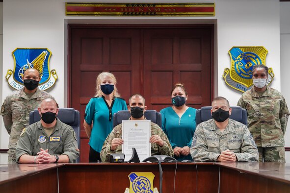 Leadership from the 15th Wing and Sexual Assault Prevention and Response office initiate Sexual Assault Prevention Month with the signing of the proclamation at Joint Base Pearl Harbor-Hickam, Hawaii, March 31, 2021. The SAPR team supports and provides assistance to victims providing different treatment options for those affected by sexual assault.(U.S. Air Force photo by Senior Airman Jermaine Ayers)