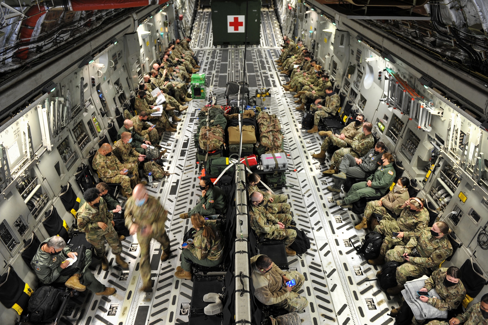 Airmen in C-17 cargo compartment