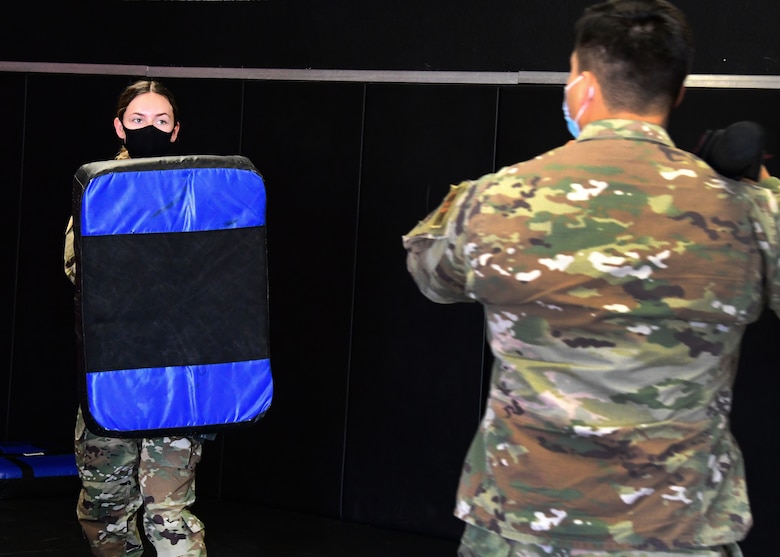 926th Security Forces Squadron practices baton drills during their Leader Led Training Course, April 9, 2021, at Nellis Air Force Base, Nevada.