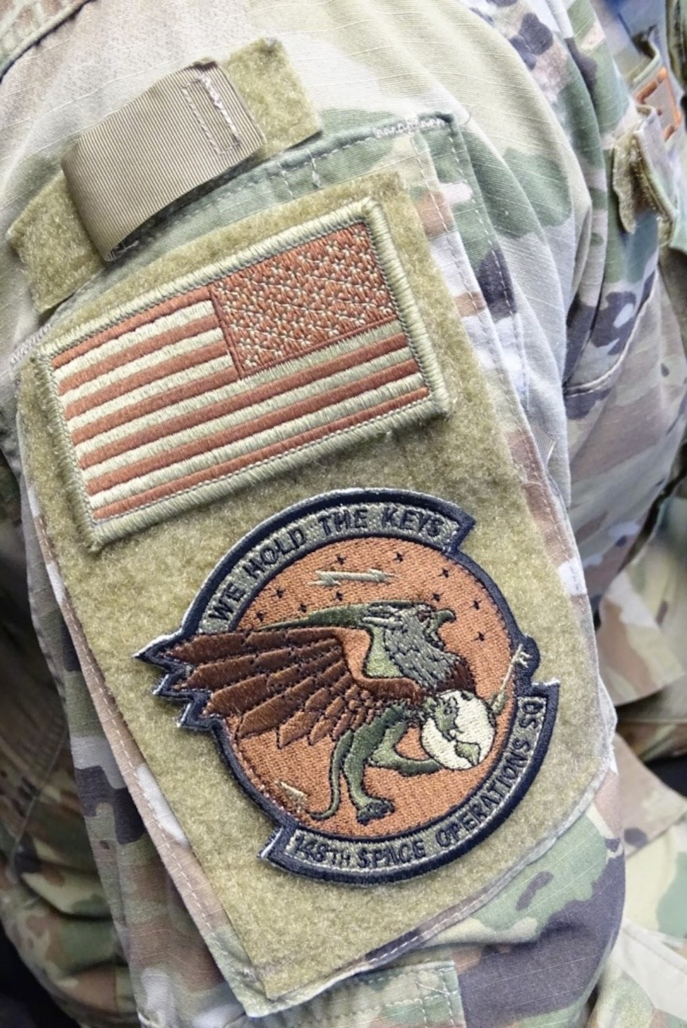 Photo of unit patch on uniform